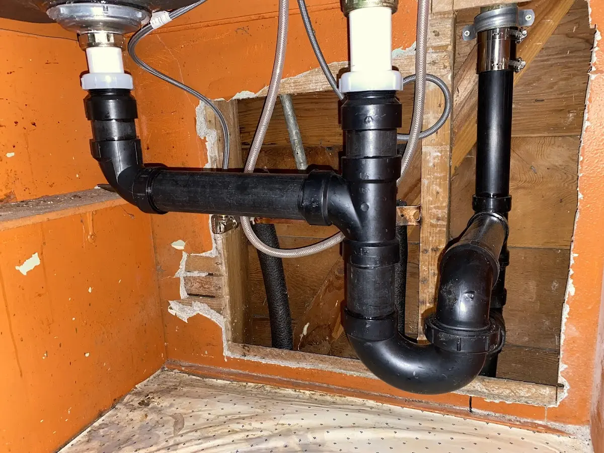Professional Garbage Disposal Repair equipment and tools on the job in Oak Bluffs